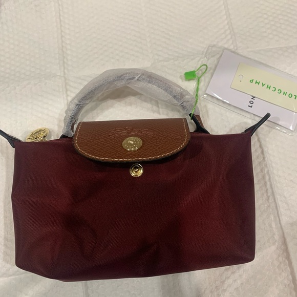 Longchamp Handbags - Longchamp small top-handle mini tote in burgundy with brown flap